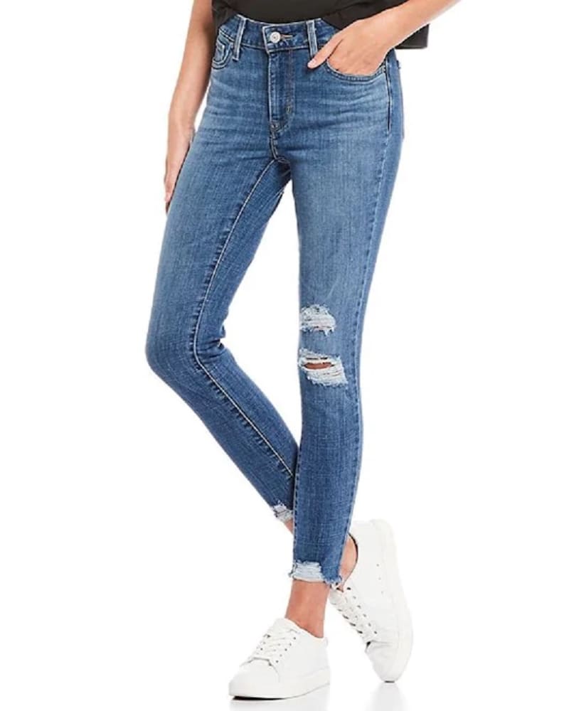 Front of a model wearing a size 22W Levi's Women's Printed High Rise Skinny Ankle Jeans Blue 22W in Blue by Levi's. | dia_product_style_image_id:308342